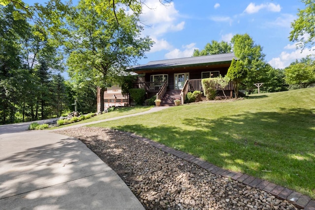 3170 Stark Rd, Fish Lake Twp, MN 55032 - view of front of house with covered porch and a front yard