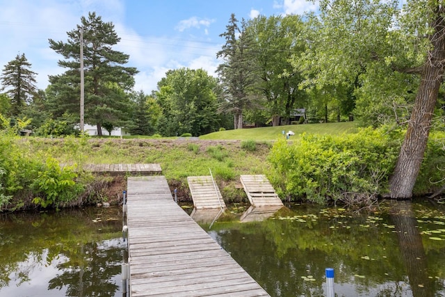 3170 Stark Rd, Fish Lake Twp, MN 55032 - dock featuring a water view and view of scattered trees