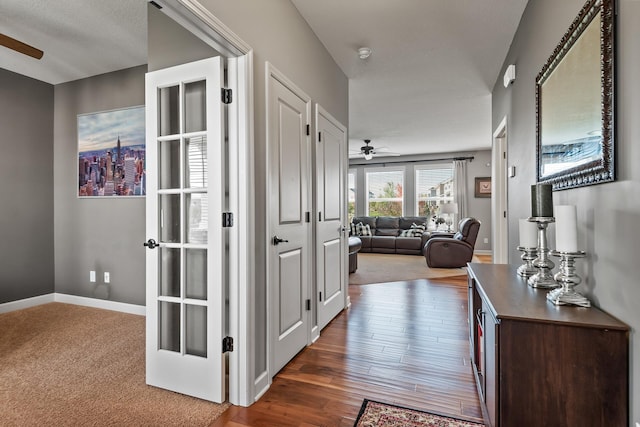 9871 7th St N, Lake Elmo, MN 55042 - hall featuring wood finished floors and baseboards