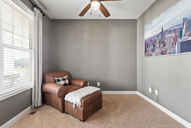 9871 7th St N, Lake Elmo, MN 55042 - sitting room with ceiling fan and light colored carpet