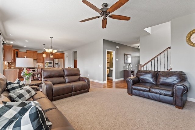 9871 7th St N, Lake Elmo, MN 55042 - living area featuring a chandelier, light carpet, ceiling fan, recessed lighting, and stairs