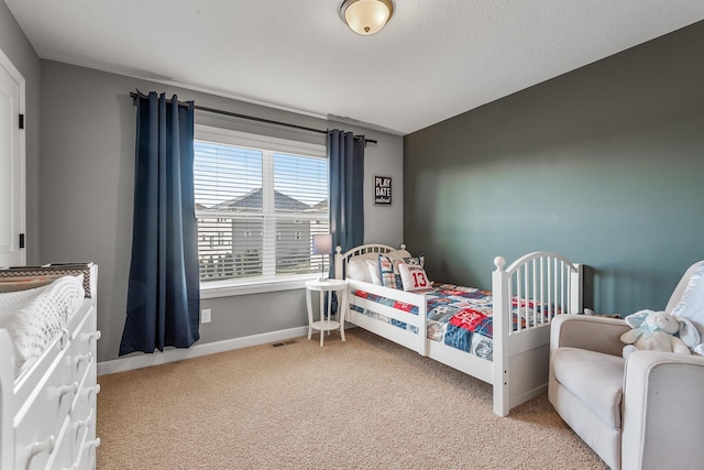 9871 7th St N, Lake Elmo, MN 55042 - bedroom featuring light colored carpet and baseboards