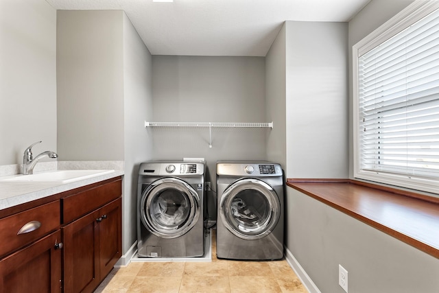 9871 7th St N, Lake Elmo, MN 55042 - laundry area with independent washer and dryer and plenty of natural light
