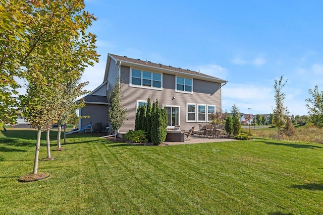 9871 7th St N, Lake Elmo, MN 55042 - back of property featuring a yard and a patio