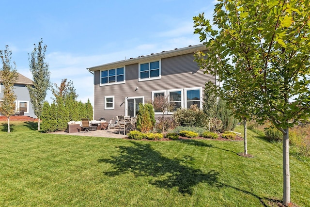 9871 7th St N, Lake Elmo, MN 55042 - back of house featuring an outdoor living space, a patio, and a lawn