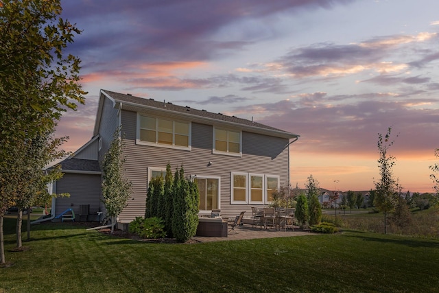 9871 7th St N, Lake Elmo, MN 55042 - rear view of property featuring a lawn, a patio area, and outdoor lounge area