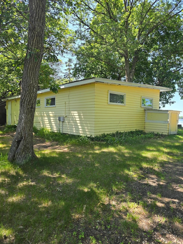 43585 Hidden Trl, Ottertail, MN 56571 - view of property exterior featuring a yard