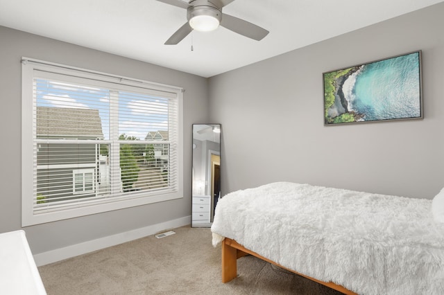 677 Sandstone Cir, Orono, MN 55356 - carpeted bedroom featuring baseboards and a ceiling fan