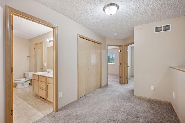 17641 69th Pl N, Maple Grove, MN 55311 - corridor with a textured ceiling and light carpet