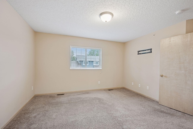 17641 69th Pl N, Maple Grove, MN 55311 - carpeted empty room with a smoke detector and a textured ceiling