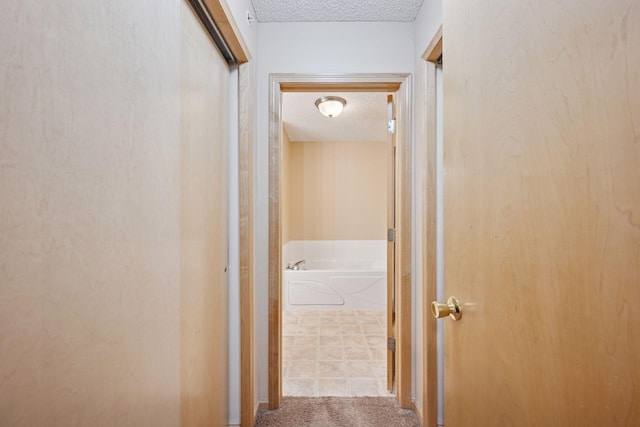 17641 69th Pl N, Maple Grove, MN 55311 - hall featuring a textured ceiling and tile patterned floors