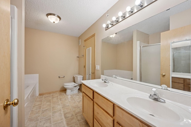 17641 69th Pl N, Maple Grove, MN 55311 - full bathroom with a bath, double vanity, a stall shower, and a textured ceiling