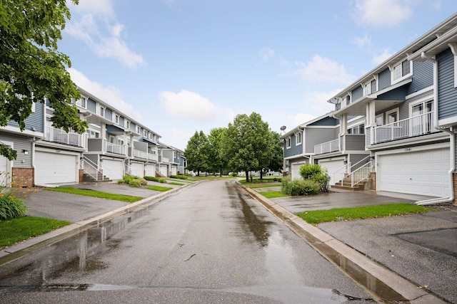 17641 69th Pl N, Maple Grove, MN 55311 - view of asphalt street featuring a residential view and curbs