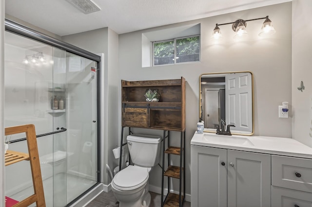 800-802 Parkview Ln, Champlin, MN 55316 - bathroom featuring vanity, a shower stall, and wood finished floors