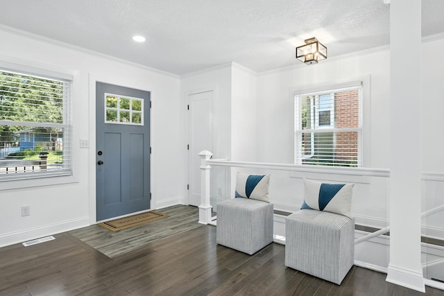 2638 Florida Ave S, Saint Louis Park, MN 55426 - foyer with crown molding, wood finished floors, recessed lighting, and a textured ceiling