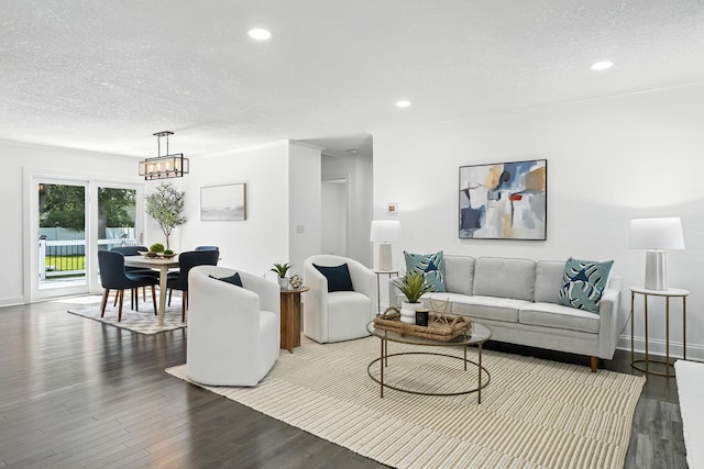 2638 Florida Ave S, Saint Louis Park, MN 55426 - living area featuring a textured ceiling, wood finished floors, and recessed lighting