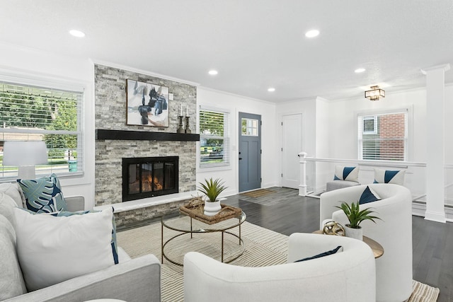 2638 Florida Ave S, Saint Louis Park, MN 55426 - living area with ornamental molding, dark wood-type flooring, recessed lighting, and a fireplace