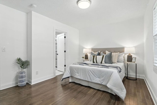 2638 Florida Ave S, Saint Louis Park, MN 55426 - bedroom with dark wood-type flooring and baseboards