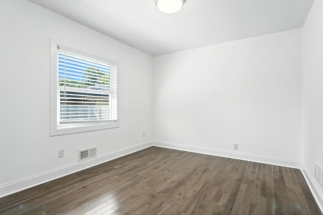 2638 Florida Ave S, Saint Louis Park, MN 55426 - empty room with dark wood-type flooring and baseboards