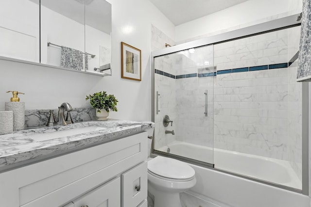2638 Florida Ave S, Saint Louis Park, MN 55426 - bathroom with vanity, shower / bath combination with glass door, and marble finish flooring