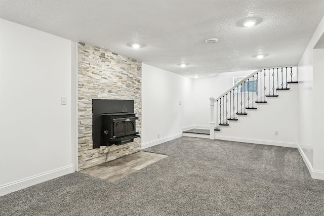 2638 Florida Ave S, Saint Louis Park, MN 55426 - unfurnished living room featuring a textured ceiling, carpet, stairway, and a wood stove