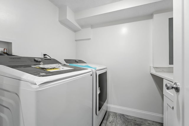 2638 Florida Ave S, Saint Louis Park, MN 55426 - laundry area with independent washer and dryer and wood finished floors