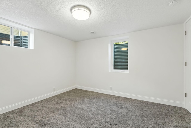 2638 Florida Ave S, Saint Louis Park, MN 55426 - unfurnished room with carpet, a smoke detector, and a textured ceiling