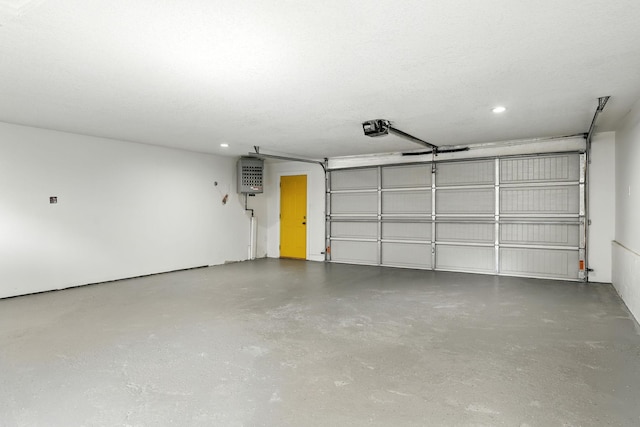 2638 Florida Ave S, Saint Louis Park, MN 55426 - garage featuring a garage door opener and recessed lighting