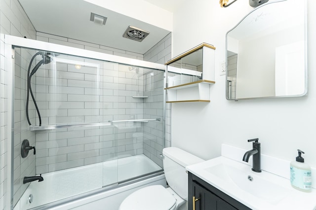 1007 12th Ave NE, Rochester, MN 55906 - bathroom with vanity and combined bath / shower with glass door