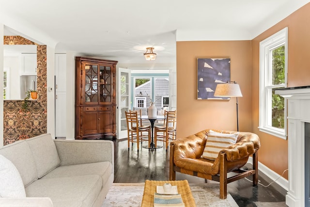 3615 33rd Ave S, Minneapolis, MN 55406 - living area with plenty of natural light, a fireplace, and wood finished floors