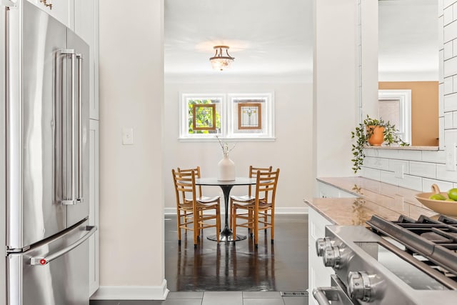 3615 33rd Ave S, Minneapolis, MN 55406 - dining space featuring baseboards and wood finished floors