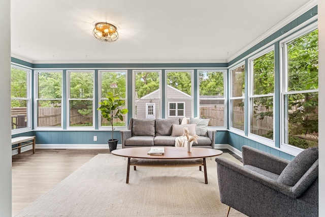 3615 33rd Ave S, Minneapolis, MN 55406 - sunroom featuring wood finished floors and ornamental molding