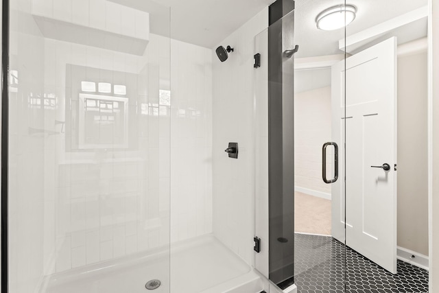 3615 33rd Ave S, Minneapolis, MN 55406 - bathroom featuring a stall shower and baseboards