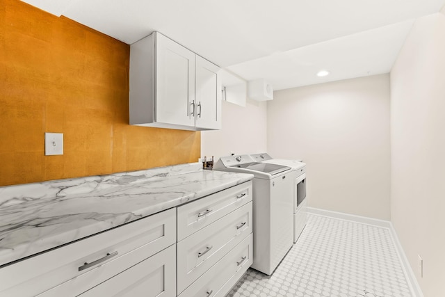 3615 33rd Ave S, Minneapolis, MN 55406 - laundry area with washer and clothes dryer, cabinet space, and recessed lighting