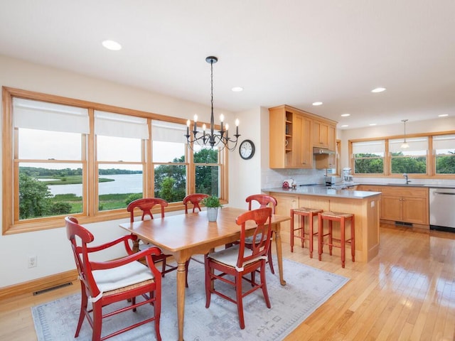 68749 195th St, Darwin, MN 55324 - dining area featuring light wood-style flooring, a chandelier, and recessed lighting