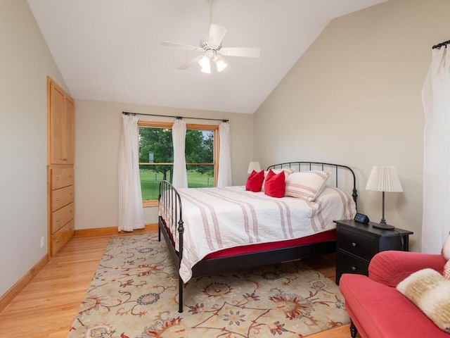 68749 195th St, Darwin, MN 55324 - bedroom featuring lofted ceiling, light wood finished floors, and a ceiling fan