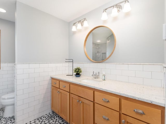 68749 195th St, Darwin, MN 55324 - full bath with tile walls, vanity, and wainscoting