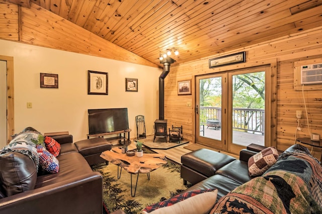 1952 75th Ave, Dresser, WI 54009 - living area with a wood stove, vaulted ceiling, wooden walls, wooden ceiling, and wood finished floors