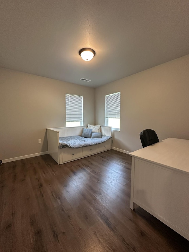 1817 Ridgewood Cir, Menomonie, WI 54751 - bedroom featuring dark wood finished floors