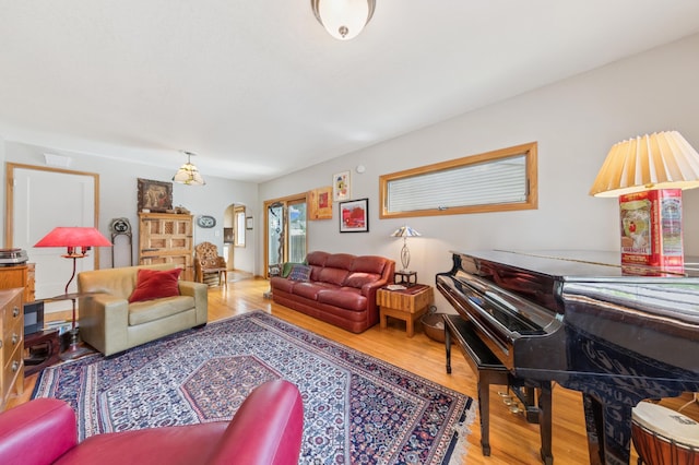 4105 31st Ave S, Minneapolis, MN 55406 - living room with arched walkways and wood finished floors