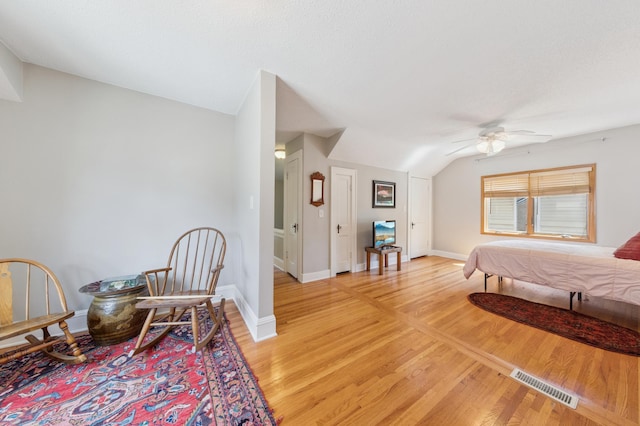 4105 31st Ave S, Minneapolis, MN 55406 - bedroom with vaulted ceiling, light wood-type flooring, and ceiling fan