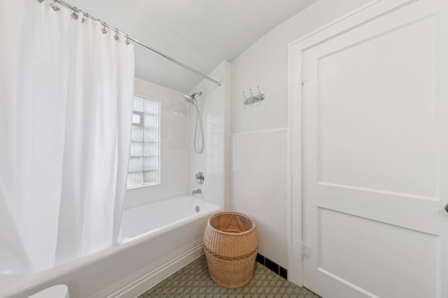 4105 31st Ave S, Minneapolis, MN 55406 - bathroom featuring shower / bath combo and tile walls