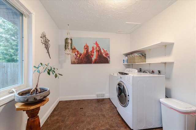 5220 Jersey Ave N, Crystal, MN 55428 - washroom featuring washing machine and dryer and a textured ceiling