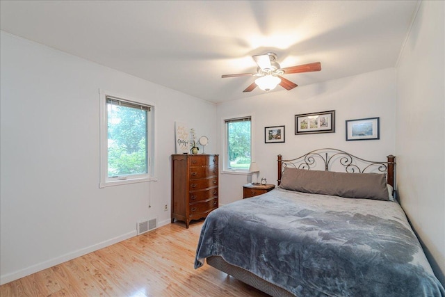5220 Jersey Ave N, Crystal, MN 55428 - bedroom featuring light wood-type flooring and a ceiling fan