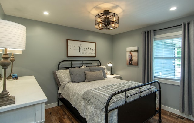 21865 512th Ln, Mcgregor, MN 55760 - bedroom with dark wood-style floors, recessed lighting, and a chandelier
