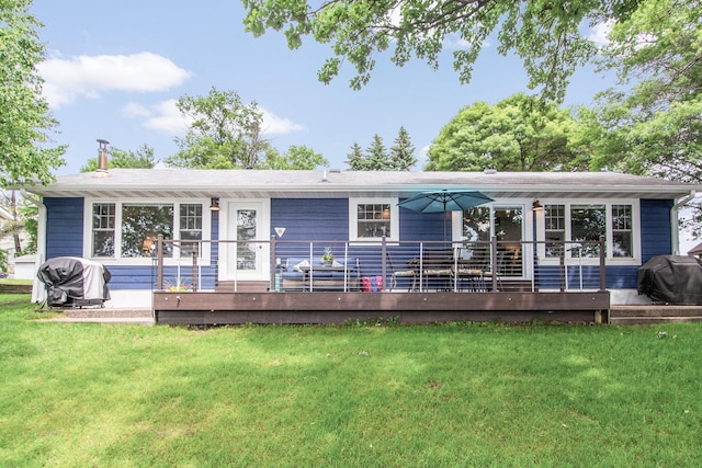 21865 512th Ln, Mcgregor, MN 55760 - rear view of property with a lawn and a deck