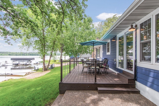 21865 512th Ln, Mcgregor, MN 55760 - wooden deck with a yard, a water view, and outdoor dining space