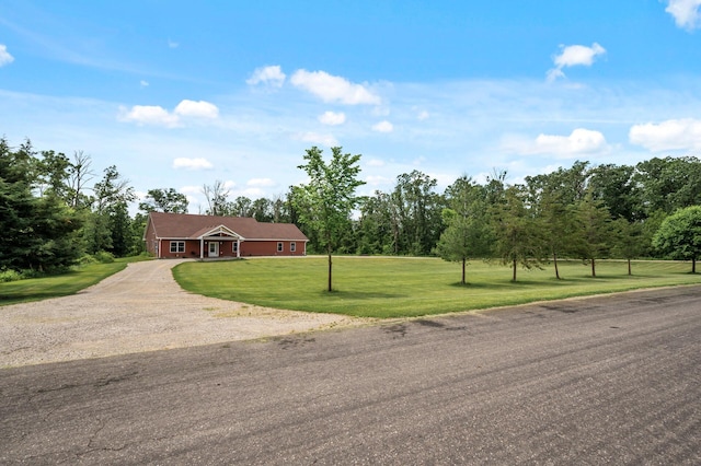 18981 247th Ave NW, Orrock Twp, MN 55309 - single story home with driveway, a front yard, and a garage