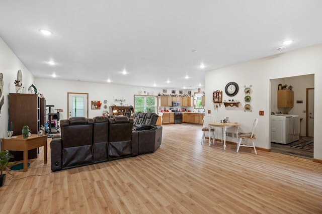 18981 247th Ave NW, Orrock Twp, MN 55309 - living area with independent washer and dryer, light wood-type flooring, and recessed lighting