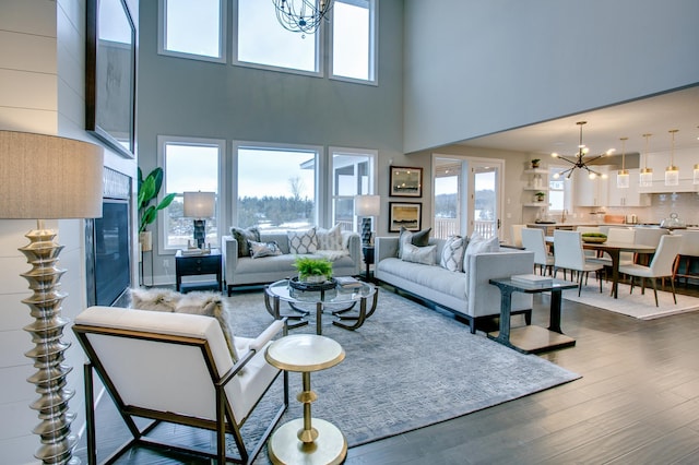 18210 102nd Pl N, Maple Grove, MN 55311 - living area featuring a chandelier, a high ceiling, and dark wood finished floors